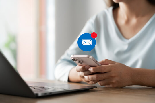 Email notification, businesswoman using smartphone with email notification icons, technology, internet, connection and innovation.