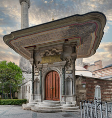 Entrance to Carpet Museum in Istanbul, Turkey, in the Sultanahmet neighborhood, fnear to the Hagia Sophia. Entrance has a pointed arch and flanked by two columns with Corinthian capitals