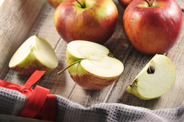 ripe apples in a wooden box