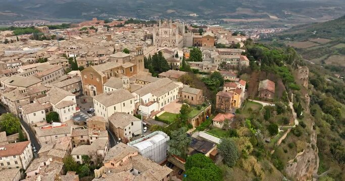 Aerial view architecture cityscape Orvieto italy. Old streets with a historic cathedral in the ancient city. High quality 4k footage