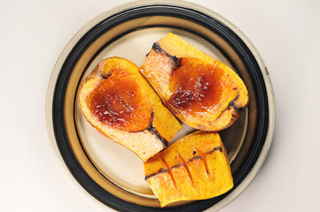 baked pumpkin with strawberry jam