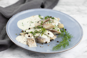 herring in wasabi sauce with fresh dill