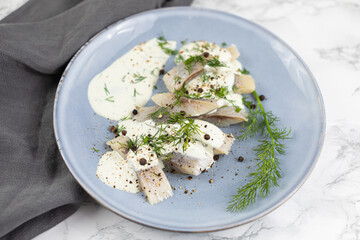 herring in wasabi sauce with fresh dill