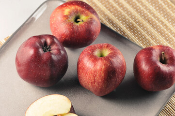 red apples on gray plate
