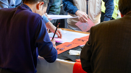 China, Spring Festival, calligrapher, handwritten Spring Festival couplets, brush characters,...