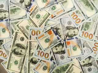 Background of 100 dollar bills, top view.