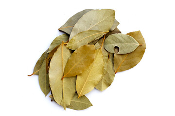 Dried bay leaves on white background.