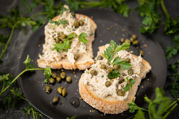 sandwich with mackerel paste, capers and parsley