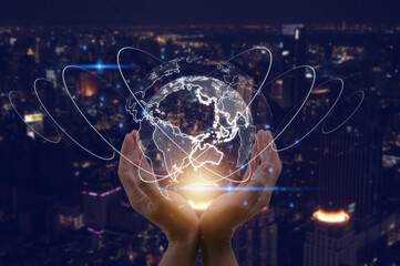 hands holsing virtual glob and blurred city background in concept of ai technology digital transformation internet network techonlogy - obrazy, fototapety, plakaty