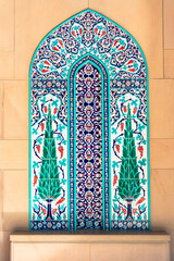 Vivid coloured turquoise mosaic on The Sultan Qaboos Grand Mosque wall