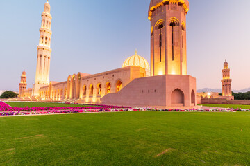 The Sultan Qaboos Grand Mosque low angle view in golden hour