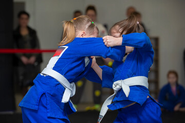 Judo kids. Little judoka girls compete.
