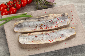 Marinated herring fillet with green onion