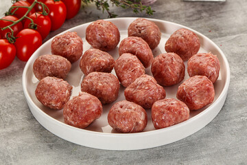 Uncooked raw beef meatball minced