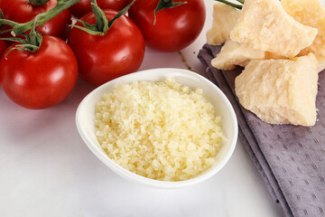Shredded Italian hard parmesan cheese