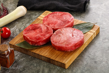 Delicous raw tuna medallion for cooking