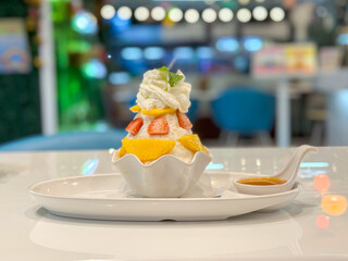 Bing su dessert with mango, strawberry and whipped cream 