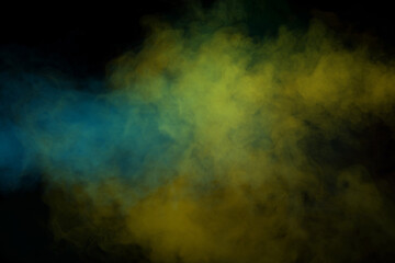 Obraz na płótnie Canvas Blue and green steam on a black background.