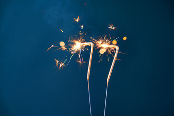 77 years celebration festive background made with Bengal fires in the form of number Seventy-seven.