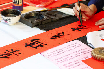 China, Spring Festival, calligrapher, handwritten Spring Festival couplets, brush characters,...