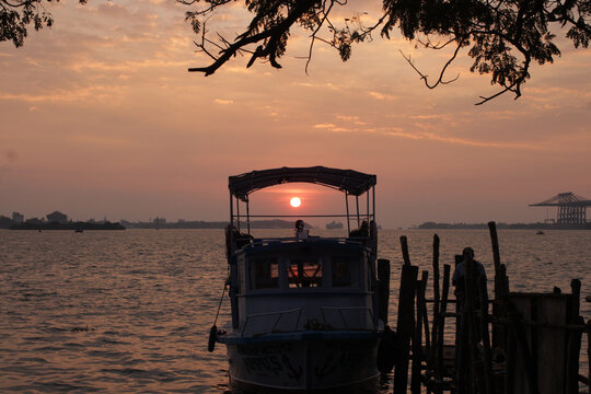 Sunsetting Through Boat