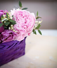 Peony on the wooden background