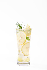 fresh lemon water in glass with lemon slices fruits isolated on white background. cooling beverage summer drink