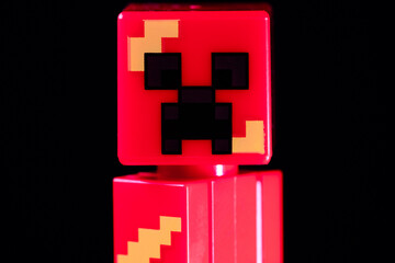 Fototapeta premium LEGO Minecraft Lava Creeper Mob on the black background
