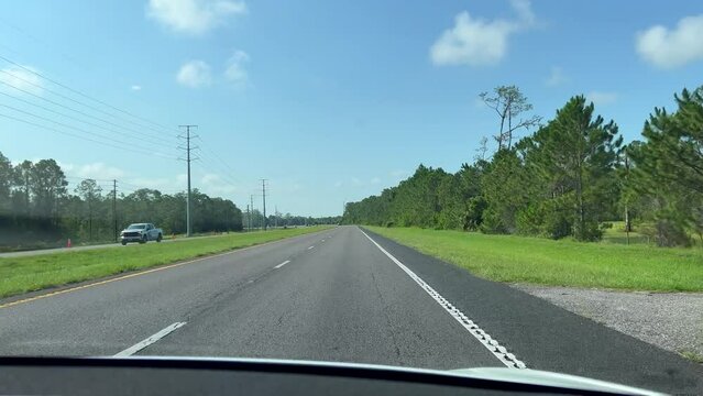 Driving through the Florida countryside on Highway 192.