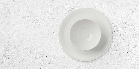 Single empty white porcelain bowl or dish on white plate over concrete table background with copy space, flat lay top view from above