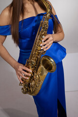 beautiful stylish saxophone in the hands of a musician	