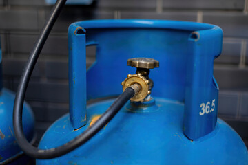 Rusty pressure regulator and operating valve of cooking gas tanks. LPG . Hose connect to the...