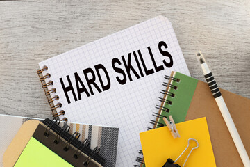 Hard skills various office supplies. pencil points to text