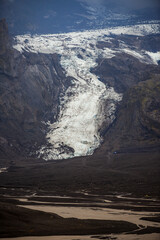 The Gígjökull glacier tumbling down the Eyjafjallajökull volcano ice cap to the wasteland caused by the 2010 eruption, Thórsmörk National Park, Iceland.