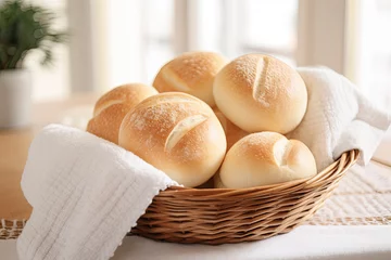 Foto op Plexiglas A Basket of Bread Rolls on a White Kitchen Counter  © JJAVA