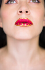 Model girl with bright makeup and red lips