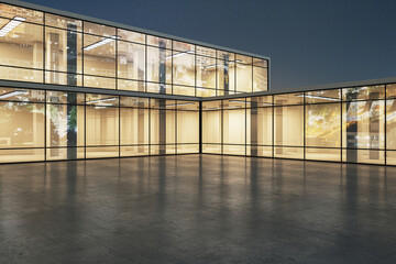 Illuminated modern building with transparent glass facade at dusk. Architecture and urban concept....