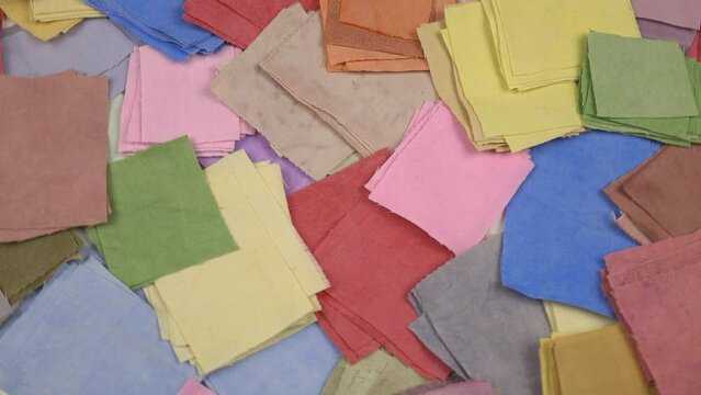 Set of multicolored fabrics of homemade dyeing for patchwork, background