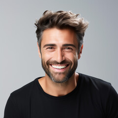 Obraz premium Young man portrait. Professional male headshot. White background and black shirt.