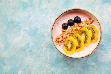 Cup of granola with yogurt and fruit