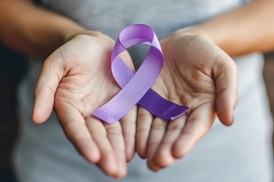 Children holding purple ribbon in hands. Domestic violence