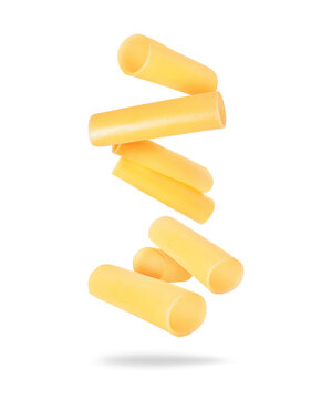 Levitation of italian cannelloni pasta tubes close up isolated on a white background