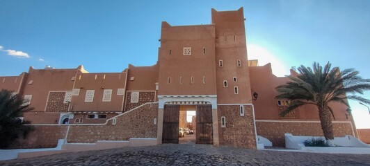 The main entrance to district of Ksar Tafilelt. With its houses made of clay and stones, typical sub-Saharan desert architecture, Ghardaïa, Oasis M'zab, Algeria