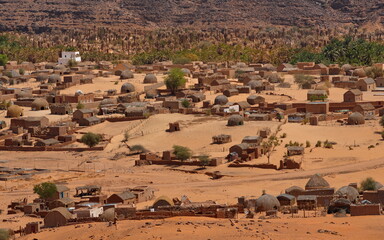 Mhaireth. Mauritania. October 05, 2021. View from the Adrar plateau to an oasis in the valley of a dried-up river in the Southwest of the Sahara Desert.