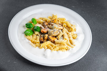 fusilli pasta with mussels seafood Mediterranean cuisine tasty fresh delicious healthy eating cooking appetizer meal food snack on the table copy space