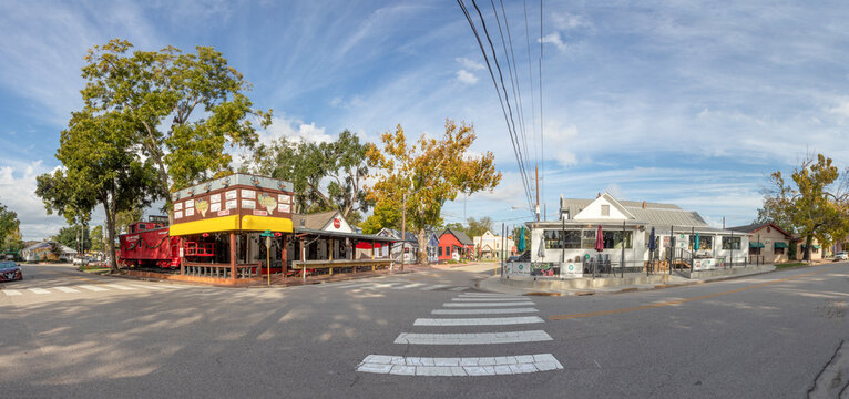 Historic vintage building, street at downtown old town spring . A city inear houston in old vintage style with wooden colorful houses.