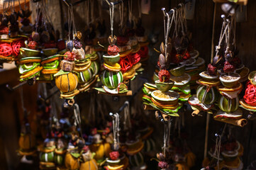 Fototapeta na wymiar New Year and Christmas fair. Dried fruit, spices, scenting decorations. Budapest, Hungary
