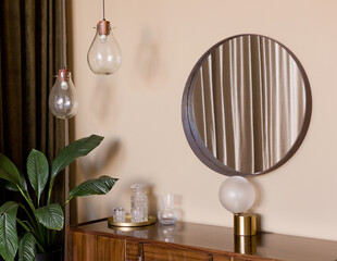 Brown wooden cabinet and mirror