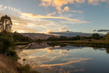 Pleasants Valley Road along Lake Solano in the sunset featuring the Vacca Mountains, California, USA 