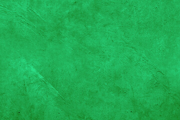 Close-up of green textured concrete wall background